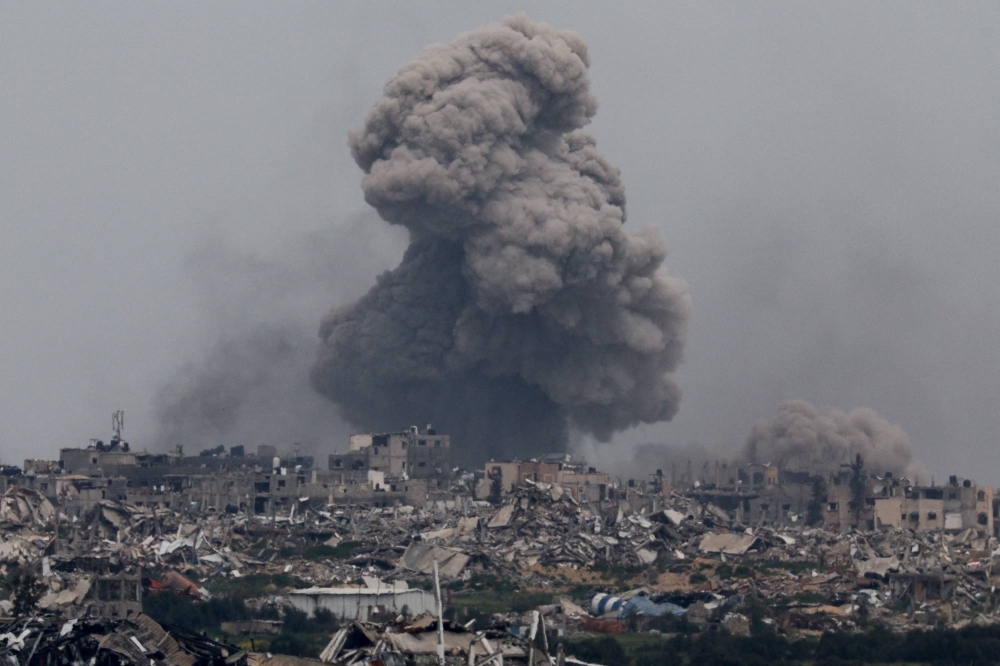 Smoke rises from Gaza, amid the ongoing conflict between Israel and Hamas, on March 17. Ending the wars in Gaza and Ukraine and deterring conflicts in the Indo-Pacific region is a key global goal.