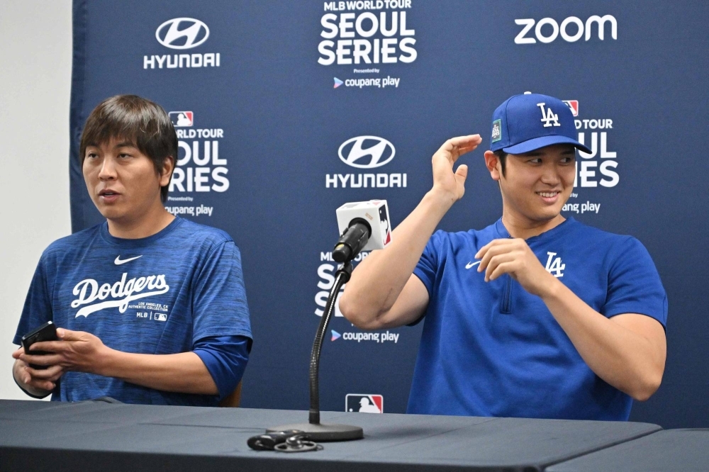 Los Angeles Dodgers' Shohei Ohtani and his then-interpreter, Ippei Mizuhara, attend a news conference at Gocheok Sky Dome in Seoul on March 16, ahead of the 2024 MLB Seoul Series baseball game between the Dodgers and San Diego Padres.