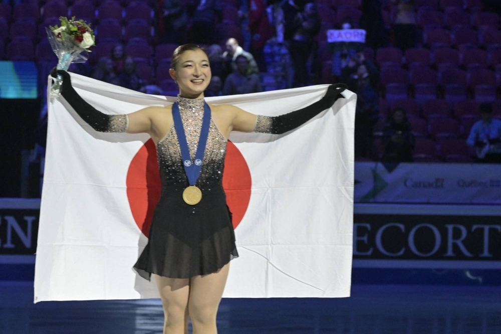 Japan's Kaori Sakamoto celebrates her win during the World Figure Skating Championships at Bell Centre in Montreal on Friday.