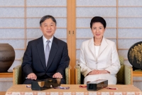 Emperor Naruhito poses for a photograph with Empress Masako at the Imperial Palace in Tokyo in February.  | Imperial Household Agency of Japan / via REUTERS