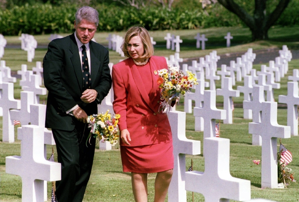 Then-U.S. President Bill Clinton and first lady Hillary Clinton tour the American Cemetery in Manila in November 1994, two years before the alleged assassination attempt.