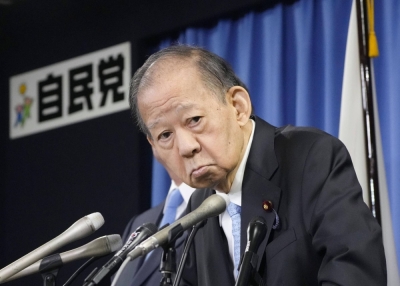 Liberal Democratic Party heavyweight Toshihiro Nikai announces that he will not run in the next Lower House election during a news conference at LDP headquarters in Tokyo on Monday.