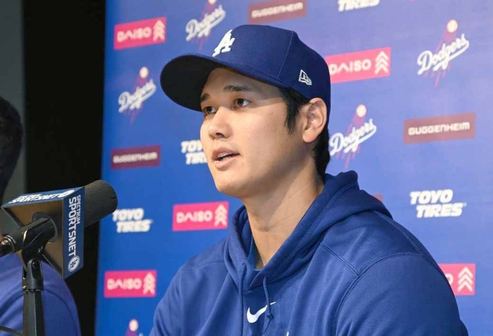 The Los Angeles Dodgers' Shohei Ohtani delivers a statement during a news conference at Dodger Stadium in Los Angeles on Monday.