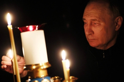 Russian President Vladimir Putin visits a church outside Moscow on Sunday, a national day of mourning following the attack on the Crocus City Hall on Friday.