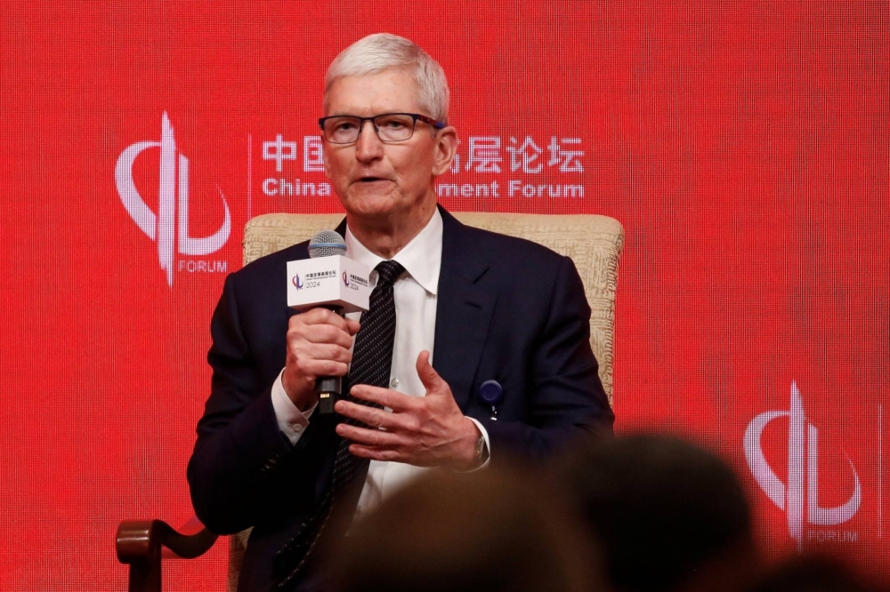 Apple CEO Tim Cook speaks at the China Development Forum 2024 in Beijing on Sunday.