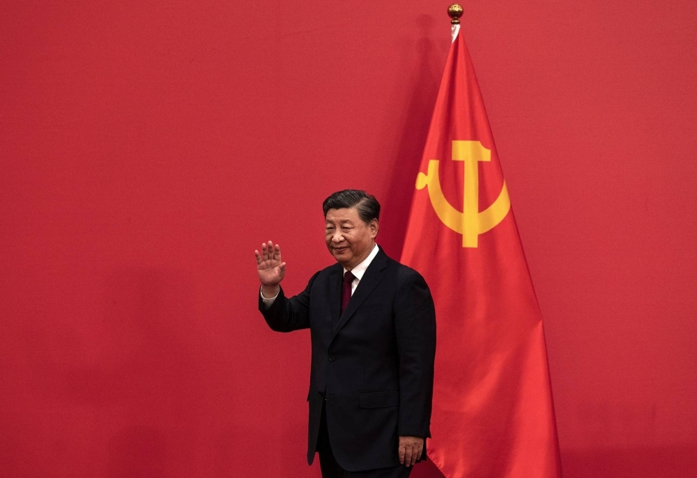 General Secretary and Chinese President Xi Jinping arrives for a news event with members of the new Standing Committee of the Political Bureau of the Communist Party of China and Chinese and Foreign journalists at The Great Hall of People in October 2022 in Beijing.