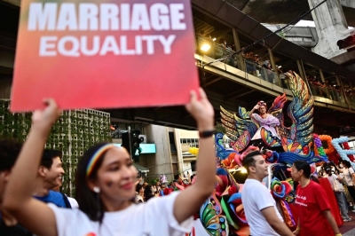 Thailand's parliament passed a same-sex marriage bill on Wednesday, paving the way for the kingdom to become the first Southeast Asian nation to recognize LGBTQ marriage equality.
