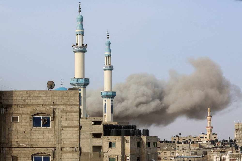 Smoke rises following an Israeli strike in the southern Gaza Strip on Wednesday.