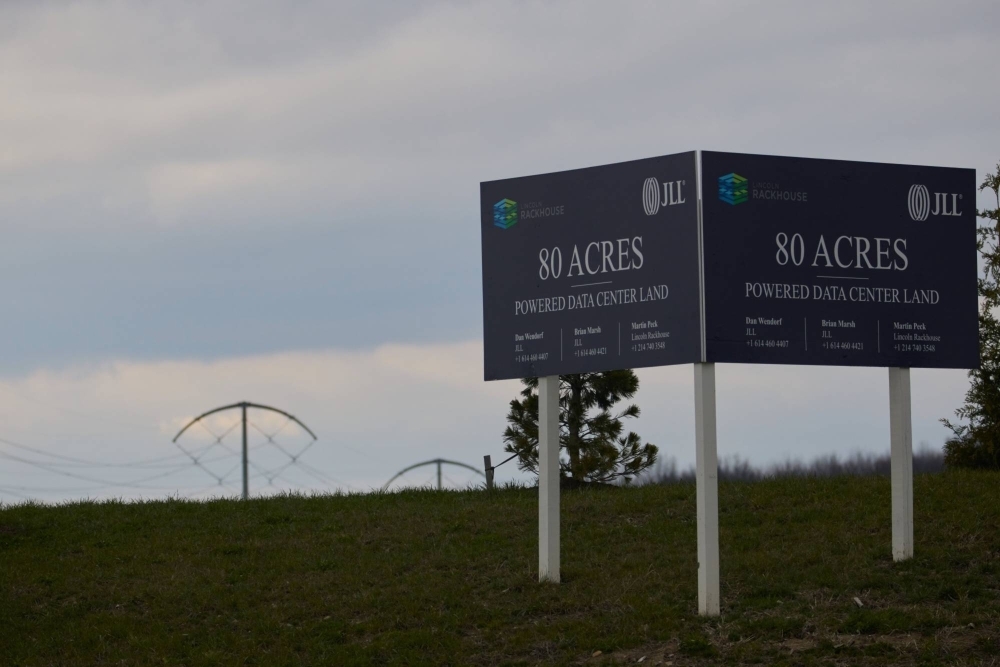 A real estate sign advertises powered data center land for sale in Johnstown, Ohio, on March 23. 