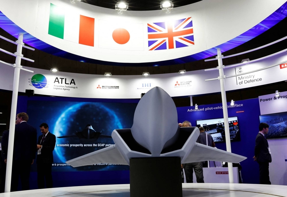 Japan’s Cabinet agreed to ease defense export rules for the nation’s next-generation fighter jet, a concept model of which is seen on display here at a defense show in Chiba in March 2023.   
