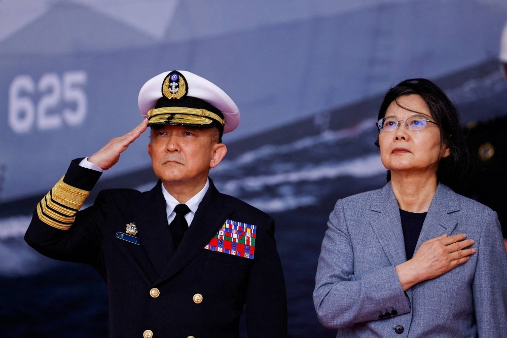 Taiwan President Tsai Ing-wen and Taiwan Navy chief Tang Hua attend the delivery ceremony of six made-in-Taiwan Tuo Chiang-class corvettes at a port in Yilan, Taiwan, on Tuesday.