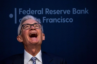 U.S. Federal Reserve chair Jerome Powell laughs during the Macroeconomics and Monetary Policy Conference at the Federal Reserve Bank of San Francisco in San Francisco on Friday.