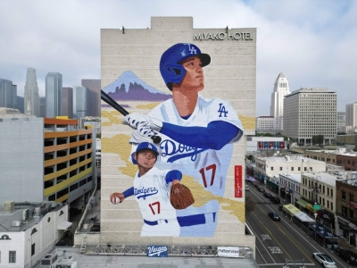 A mural showing Los Angeles Dodgers player Shohei Ohtani is seen on the Miyako Hotel in Little Tokyo in downtown Los Angeles on Thursday. The mural, by artist Robert Vargas, is 150 feet (46 meters) tall and is titled "LA Rising."