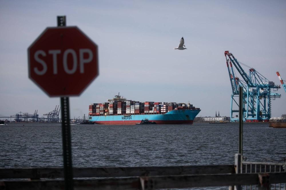 Tugboats guide the Maersk Atlanta container ship at the Port of Newark in Newark, New Jersey, on Saturday. The bridge collapse Tuesday that shut the Port of Baltimore and closed a major highway will cause weeks or months of transportation disruptions in the Mid-Atlantic region.
