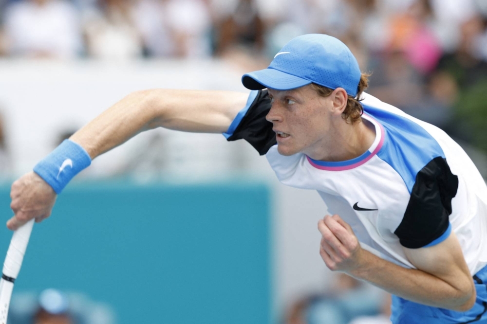 Jannik Sinner serves against Daniil Medvedev in their semifinal match in the Miami Open in Miami Gardens, Florida, on Friday. Sinner went on to win the tournament by beating Grigor Dimitrov in the final on Sunday.