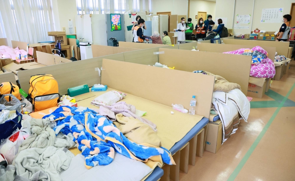 Cardboard beds at an evacuation center in Wajima, Ishikawa Prefecture, on Jan. 31. Because evacuation shelters are operated by municipalities, the quality of disaster relief varies depending on the strength of each local government, one expert points out.