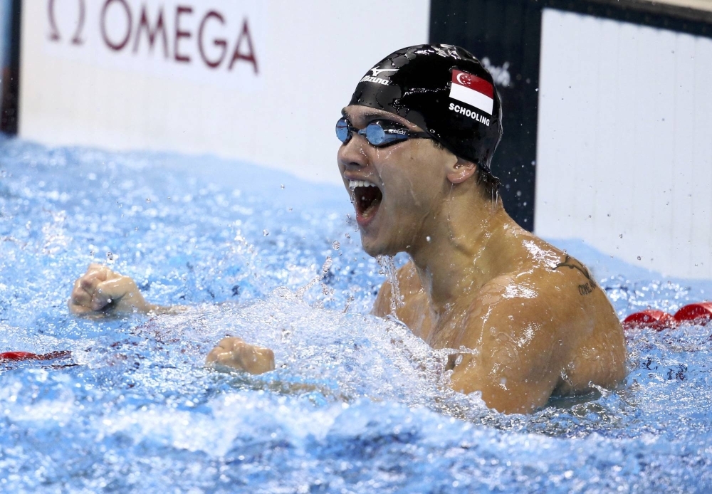 Joseph Schooling of Singapore celebrates after winning the men's 100m Butterfly final at the 2016 Rio Olympics in Rio de Janeiro in August 2016.