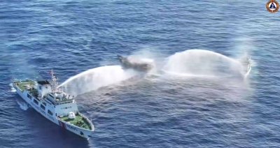 Chinese Coast Guard ships fire water cannons at a Philippine boat during a supply mission near Second Thomas Shoal in the disputed South China Sea on March 5. This incident highlights the danger that such confrontations could have for sparking a wider conflict.