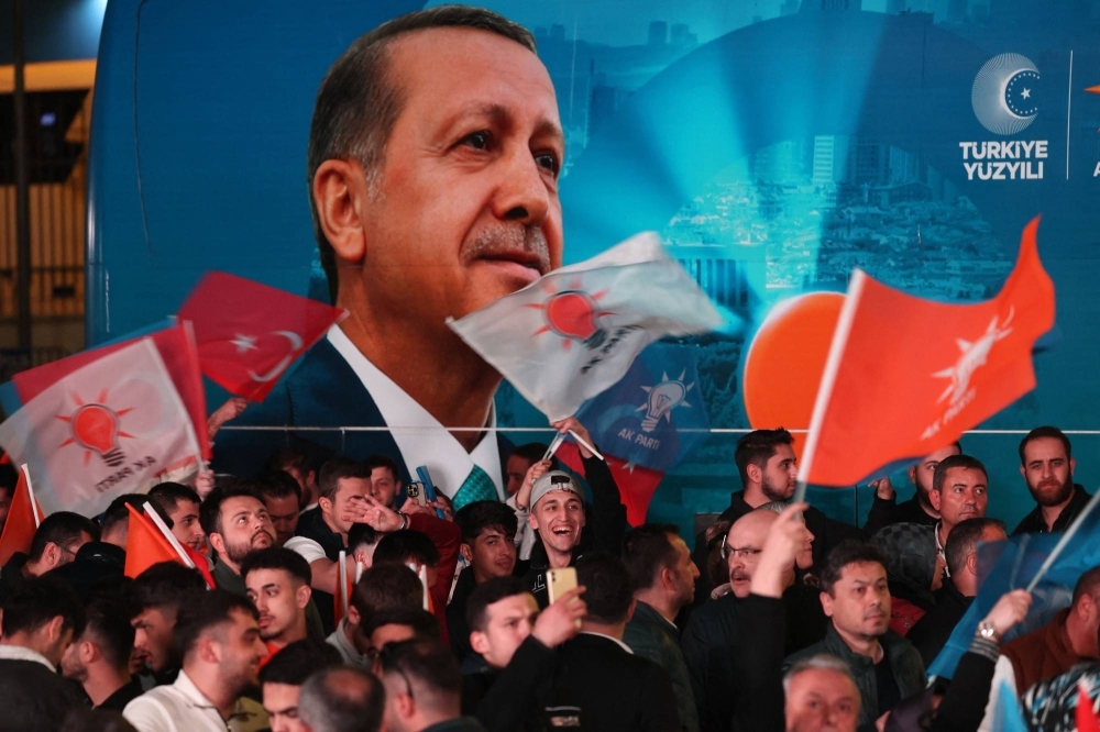 Turkish President Recep Tayyip Erdogan told dismayed supporters overnight that they "must not waste" the four years remaining before the next presidential vote.