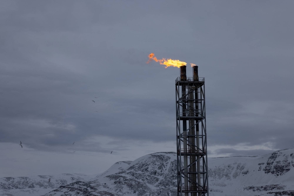 Flames blaze from a chimney at Western Europe's largest liquefied natural gas plant Hammerfest LNG in Hammerfest, Norway