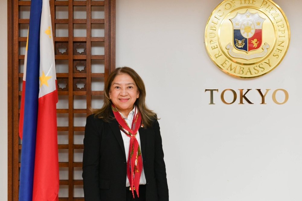 Garcia-Albano poses for a photo at the country's embassy in Tokyo on Wednesday.