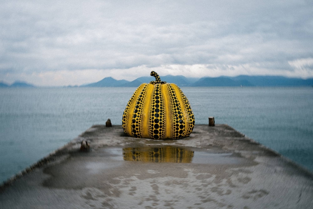 Yayoi Kusama’s “Pumpkin,” once the victim of high waves that dragged it into the sea, sits at the end of a pier on the south side of Naoshima.