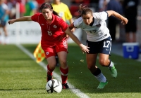 Former Canada soccer player Diana Matheson (left, in June 2013) is one of the driving forces behind a proposed new professional women's soccer league in the country. | Reuters
