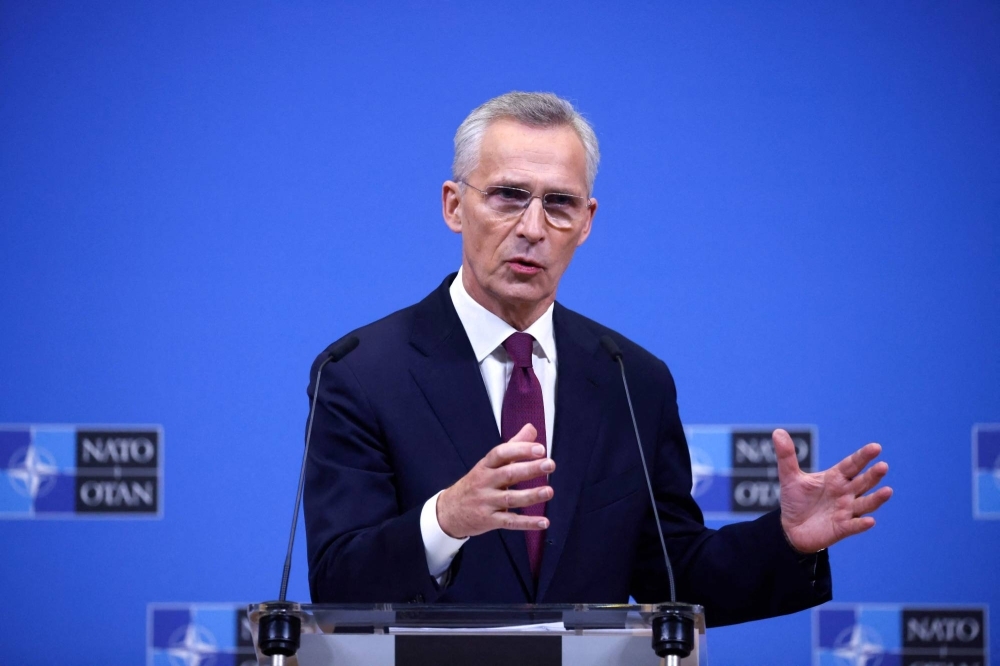 NATO Secretary-General Jens Stoltenberg speaks during a news conference at NATO Headquarters in Brussels on Thursday.