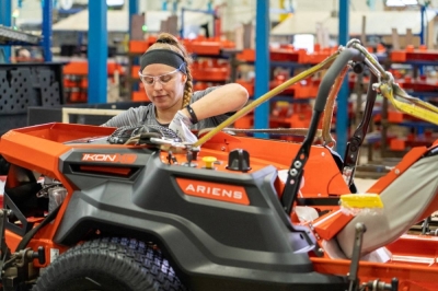 An Ariens Company employee works on the assembly line at the company's plant in Brillion, Wisconsin.