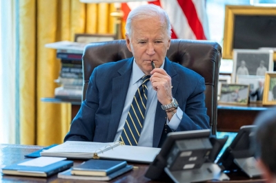 U.S. President Joe Biden speaks on the phone with Israeli Prime Minister Benjamin Netanyahu at the Oval Office in Washington on Thursday.