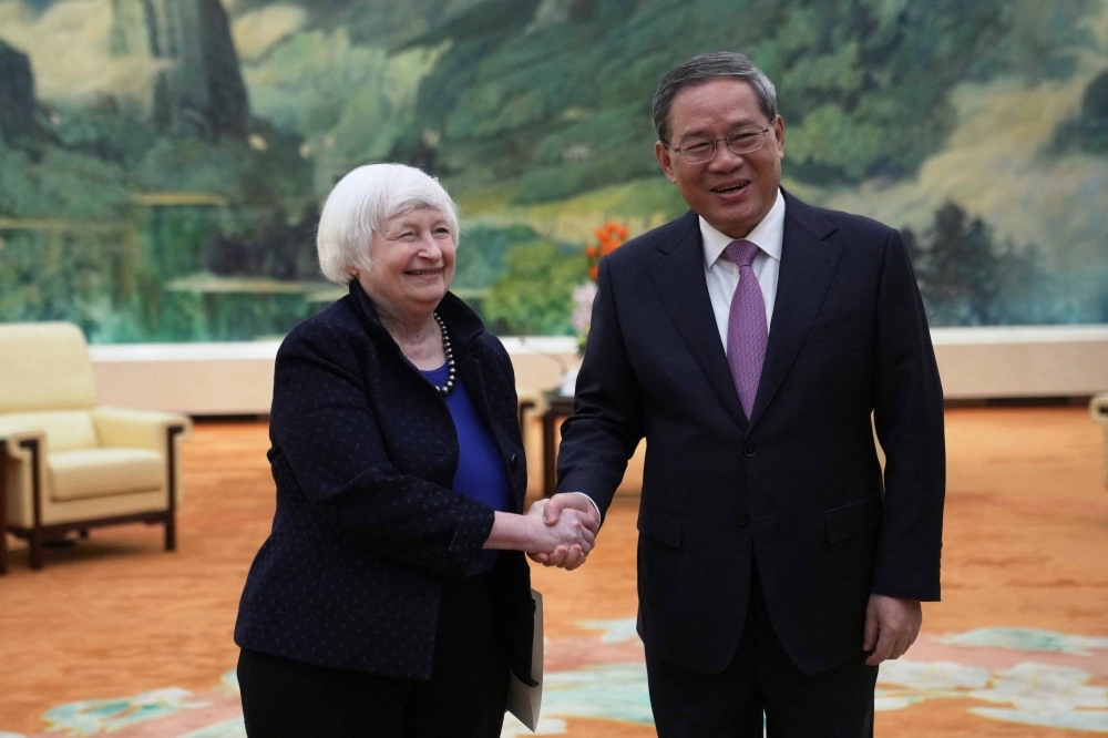 U.S. Treasury Secretary Janet Yellen meets Chinese Premier Li Qiang at the Great Hall of the People in Beijing on Sunday.