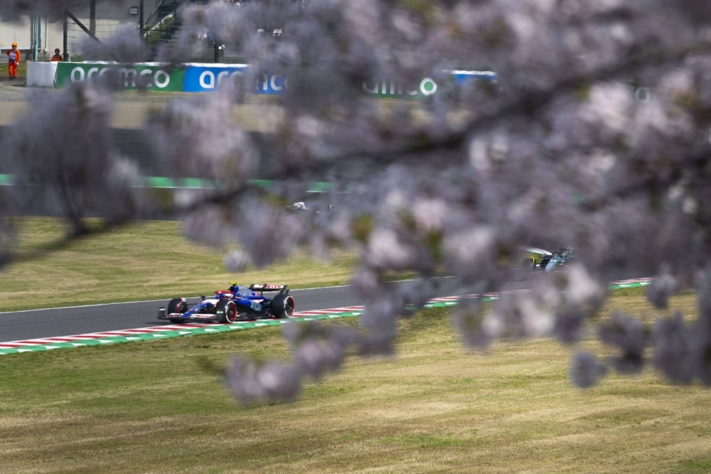 Japanese driver Yuki Tsunoda competes in the Japanese Grand Prix on Sunday as the race's spring debut saw cherry blossoms greet the 20 drivers on the Formula One grid. 