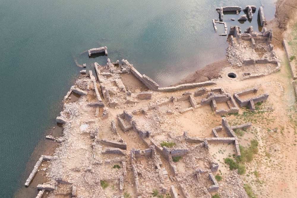 Aerial view of a previously submerged village revealed by low water levels in Cabril dam reservoir in Pedrogao Grande, Portugal, on July 13, 2022. 