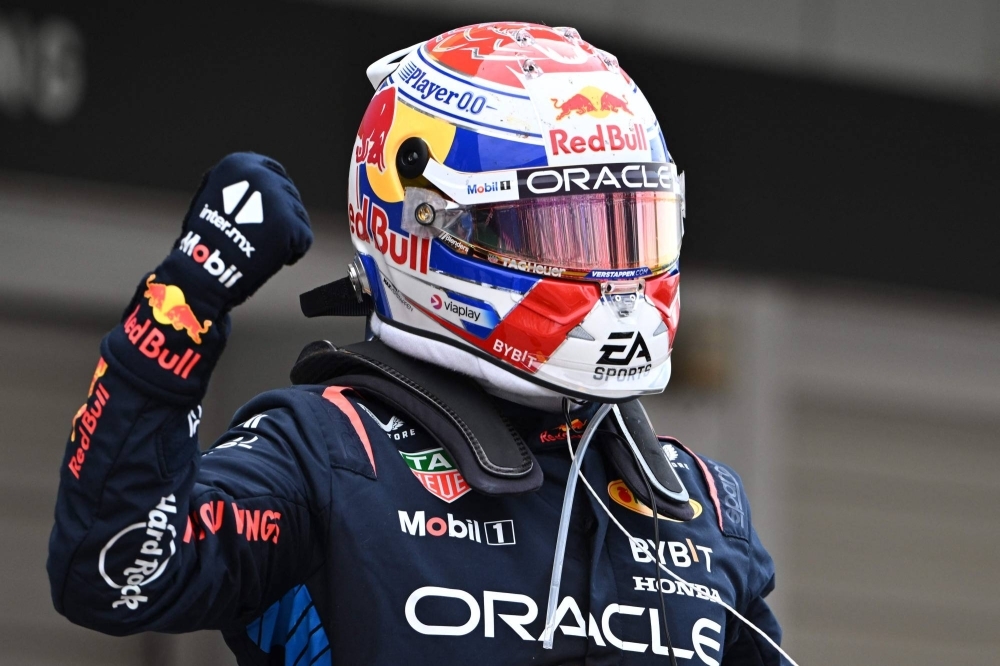 Red Bull Racing's Max Verstappen celebrates winning the Formula One Japanese Grand Prix race at the Suzuka circuit in Suzuka, Mie Prefecture, on Sunday.