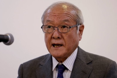 Finance Minister Shunichi Suzuki says authorities are watching exchange-rate moves closely and won't rule out any options.
