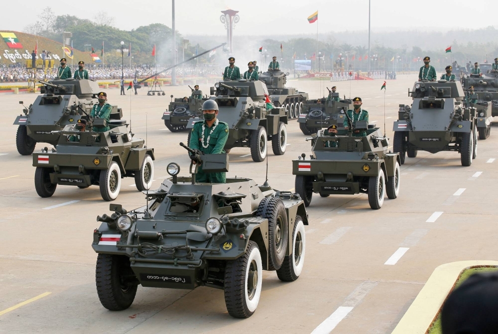 Military personnel participates in a parade on Armed Forces Day in Naypyitaw, Myanmar, in 2021. 