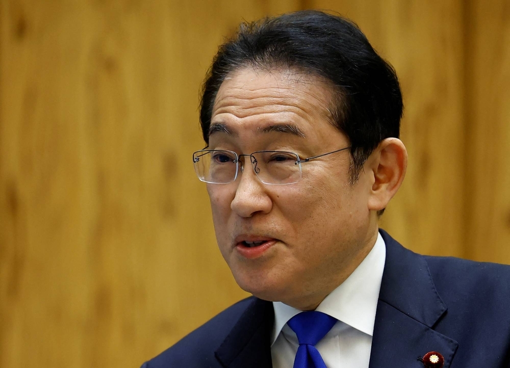 Prime Minister Fumio Kishida is interviewed Tokyo on April 5. Kishida left for the U.S. on Monday amid record low poll numbers due to his handling of the political funds scandal that has rocked the LDP.