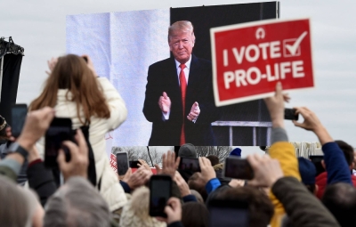 Pro-life demonstrators listen to U.S. President Donald Trump as he speaks at the 47th annual "March for Life" in Washington on January 24, 2020. 