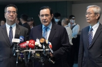 Ma Ying-jeou, center, on April 1 | Getty Images / via Bloomberg