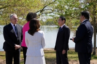 Prime Minister Fumio Kishida and his wife Yuko Kishida attend an event to pledge 250 new cherry blossom trees to Washington at the historic Tidal Basin on Wednesday. | Reuters