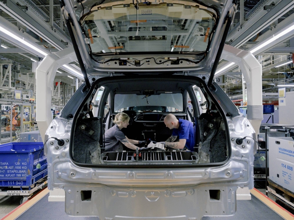 The assembly line at the Volkswagen factory in Zwickau, Germany, on March 14. The factory stopped producing gasoline-powered Golfs and switched to electric vehicles, illuminating the risks and opportunities for factory towns and cities.