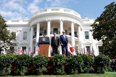 U.S. President Joe Biden welcomes Prime Minister Fumio Kishida during an arrival ceremony at the White House on Wednesday. The two leaders are also meeting with Philippine President Ferdinand Marcos, where defense ties between the three nations were set to be high on the agenda. 