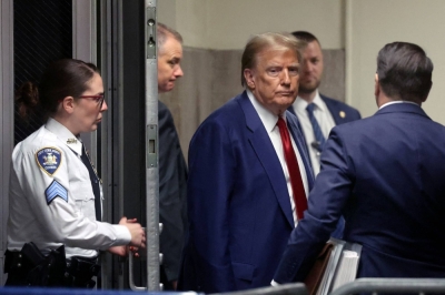 Former U.S. President Donald Trump leaves the court after a pre-trial hearing in a hush money case in New York on March 25. As Trump faces a slew of trials, his opponents should take the comparison to Hitler's court room dramas seriously.