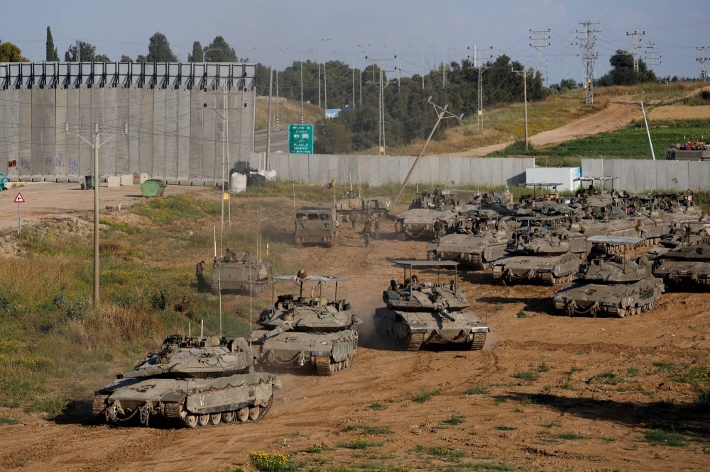 Israeli tanks move toward Gaza on Wednesday. Analysts say Israel would benefit from a truce with Hamas, even if it was just a tactical move, after losing 260 soldiers in Gaza.