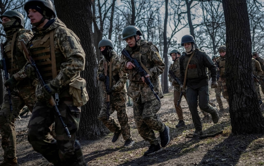 Ukrainian armed forces volunteers take part in basic training in Kyiv last month. Military analysts say Ukraine needs to address acute problems with manpower and a shortage of artillery shells.