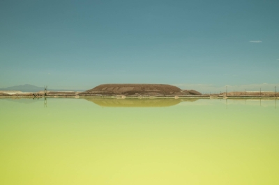 A brine pool at an SQM lithium mine on the Atacama salt flat in the Atacama Desert, Chile. The industry that deals with one of the world’s most important commodities is asking whether it's doomed to repeat a boom and bust cycle again and again.