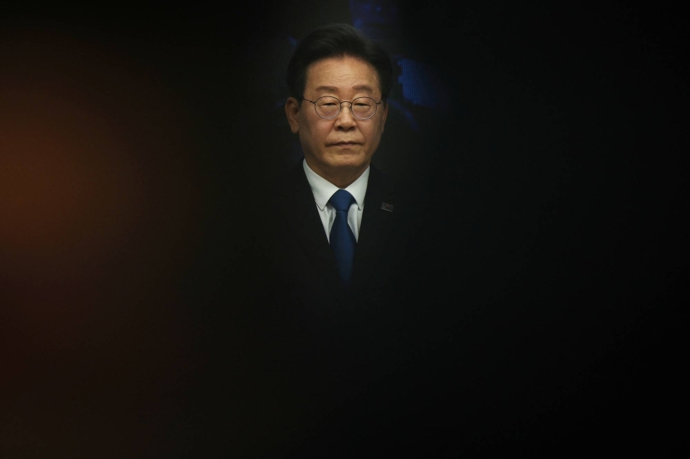 Lee Jae-myung, leader of the main opposition Democratic Party, attends an event in Seoul on Thursday. He is one of the most polarizing political figures in South Korea with a fervent base of supporters on the left and a large block of opponents in the conservative camp.