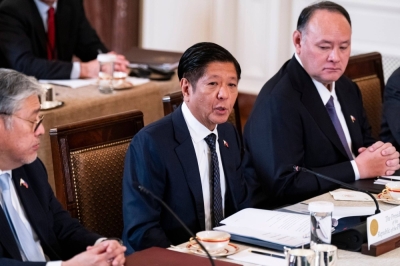Philippine President Ferdinand Marcos Jr., (center) speaks during a meeting at the White House in Washington on Thursday.