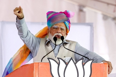 Indian Prime Minister Narendra Modi addresses supporters during an election campaign rally in Pushkar, India, on April 6, ahead of the country's upcoming general election starting Friday.