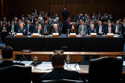 Leaders of intelligence agencies testify before a congressional committee about worldwide threats in Washington on March 11.